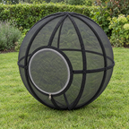 Whisker Wheel cat exercise ball in Black on a garden lawn
